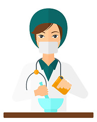 Image showing Pharmacist preparing medicine.