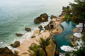 Image showing Pool at the edge of the sea in a tropical resort

