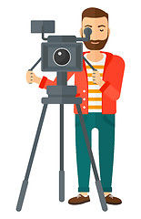 Image showing Cameraman with movie camera.