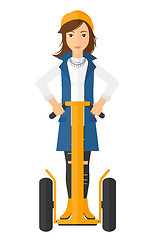 Image showing Woman riding on segway.