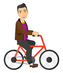 Image showing Man riding bicycle.