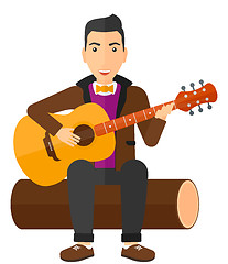 Image showing Man playing guitar.