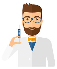 Image showing Doctor holding syringe.