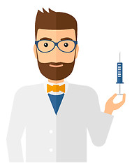 Image showing Doctor holding syringe.