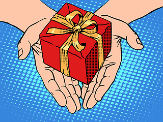 Image showing Male hands heart shape gift box