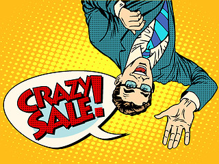 Image showing Crazy sale announcement man upside down