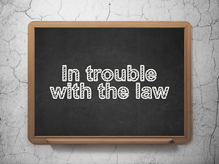 Image showing Law concept: In trouble With The law on chalkboard background