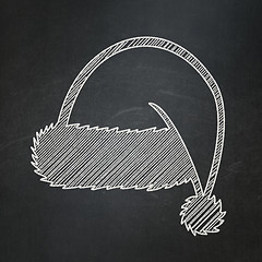 Image showing Holiday concept: Christmas Hat on chalkboard background