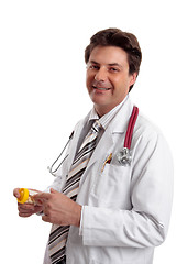 Image showing Smiling doctor with medicine