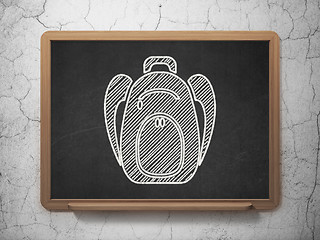 Image showing Learning concept: Backpack on chalkboard background