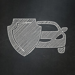 Image showing Insurance concept: Car And Shield on chalkboard background