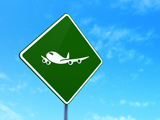 Image showing Tourism concept: Airplane on road sign background