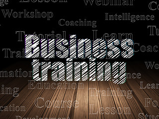 Image showing Learning concept: Business Training in grunge dark room