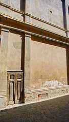 Image showing old brick italian facade with door