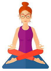 Image showing Woman meditating in lotus pose.