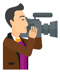 Image showing Cameraman with video camera.