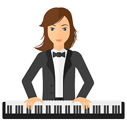 Image showing Woman playing piano.