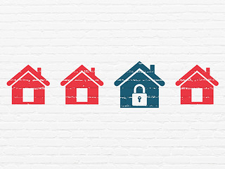 Image showing Protection concept: home icon on wall background