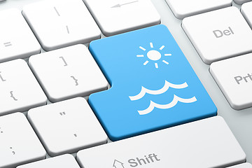 Image showing Vacation concept: Beach on computer keyboard background