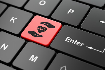 Image showing Insurance concept: Heart And Palm on computer keyboard background