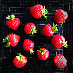 Image showing Ripe strawberries on back plate