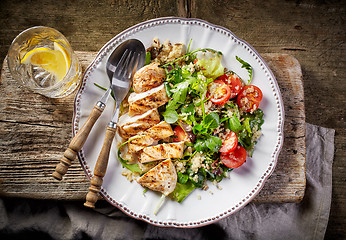 Image showing Quinoa and vegetable salad and grilled chicken