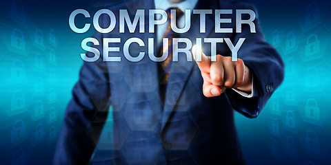 Image showing Manager Pushing COMPUTER SECURITY Onscreen