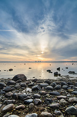 Image showing Beautiful sunrise on the sea. Views of Tallinn.