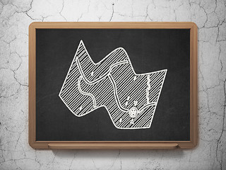 Image showing Vacation concept: Map on chalkboard background