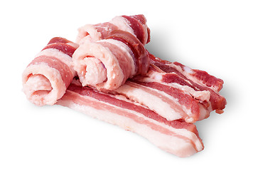 Image showing Three strips of bacon rolls