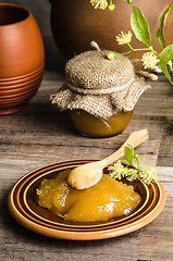 Image showing Saucer with lime honey on the table,\rclose-up