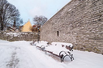 Image showing Bench and street lamp in the park winter Old Tallinn