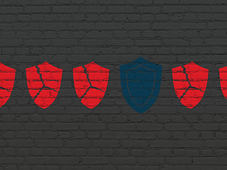 Image showing Privacy concept: shield icon on wall background