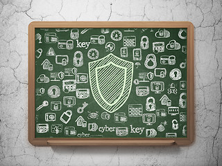 Image showing Protection concept: Shield on School Board background