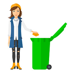 Image showing Woman throwing trash.