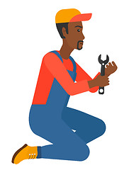 Image showing Repairman holding spanner.