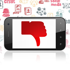 Image showing Social media concept: Smartphone with Thumb Down on display