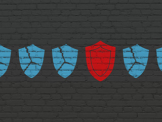 Image showing Protection concept: shield icon on wall background