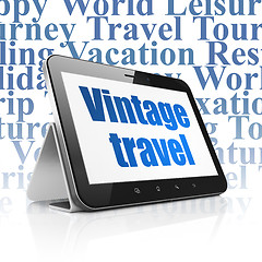 Image showing Vacation concept: Tablet Computer with Vintage Travel on display
