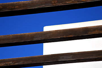 Image showing piece of brown   wood as a roof in the sky  lanzarote