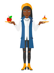 Image showing Woman with apple and cake.