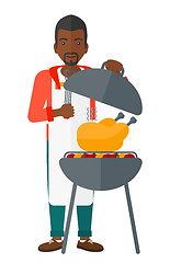 Image showing Man preparing barbecue.