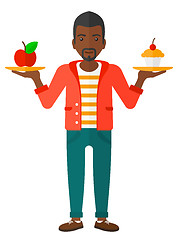 Image showing Man with apple and cake.