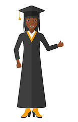 Image showing Graduate showing thumb up sign.