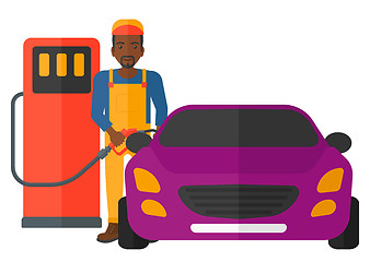 Image showing Man filling up fuel into car.