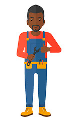 Image showing Cheerful repairman with spanner.