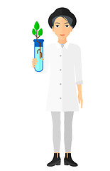 Image showing Laboratory assistant with test tube.