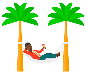 Image showing Man chilling in hammock.