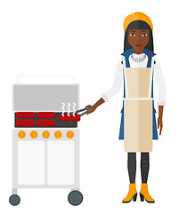 Image showing Woman preparing barbecue.