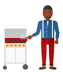 Image showing Man preparing barbecue.